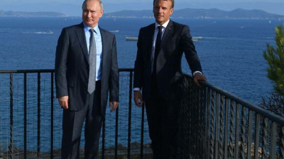 Путин обсудил с Макроном ситуацию в Сирии и на Украине