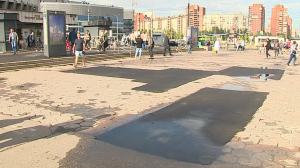 Асфальтовые заплатки возле метро «Проспект Большевиков»