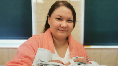 Дочь Владимира Путина показала фото новорожденного сына