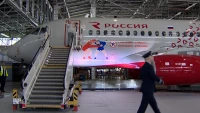 «Говорим самбо – слышим Россия»: оригинальную ливрею получил еще один российский самолет Суперджет 100