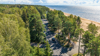 Александр Беглов: Завершен ремонт 30-километрового участка Приморского шоссе –  самого протяженного объекта 2025 года