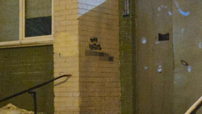 В Петербурге задержала рецидивиста, изрисовавшего рекламой наркотиков стены домов