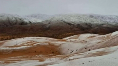 Крайне редкое явление: дюны Сахары покрылись снегом
